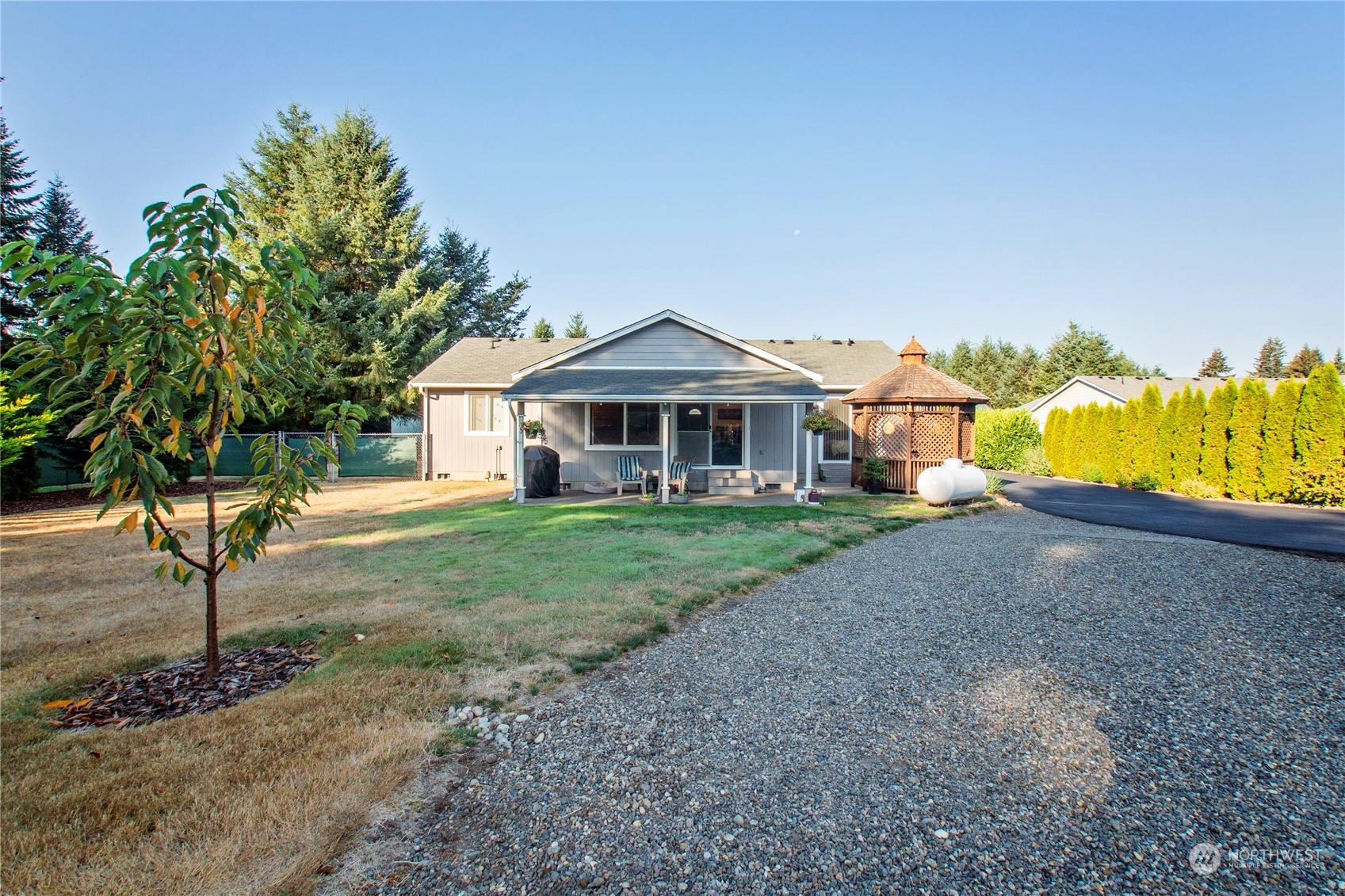 17406 Privet Court Southwest Rochester, WA 98579 - Photo 9 of 34 a front view of a house with garden