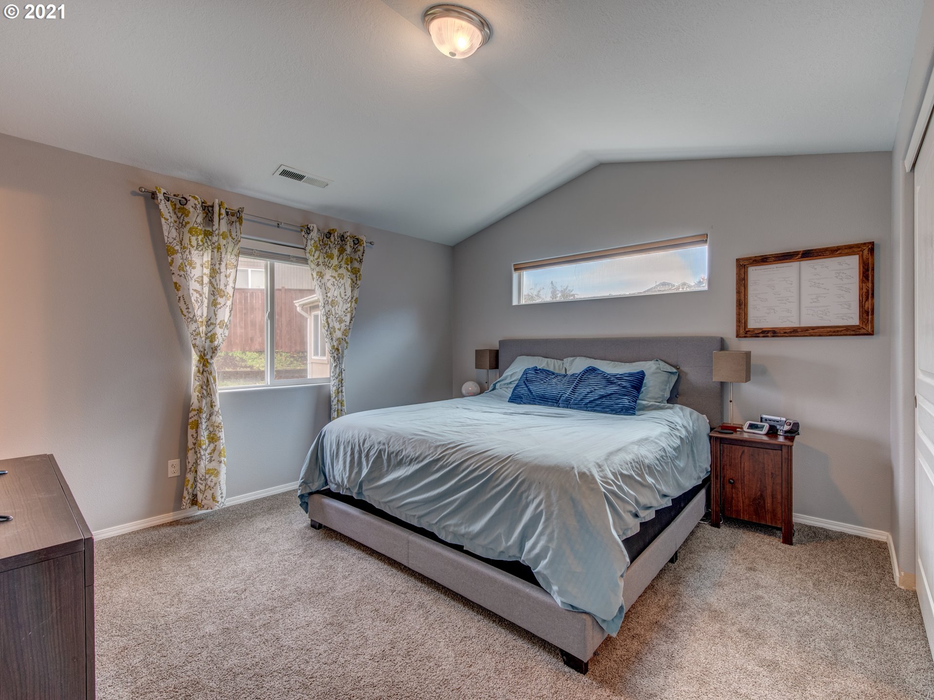 4808 Holly Street Springfield, OR 97478 - Photo 14 of 27 a bedroom with a bed and window