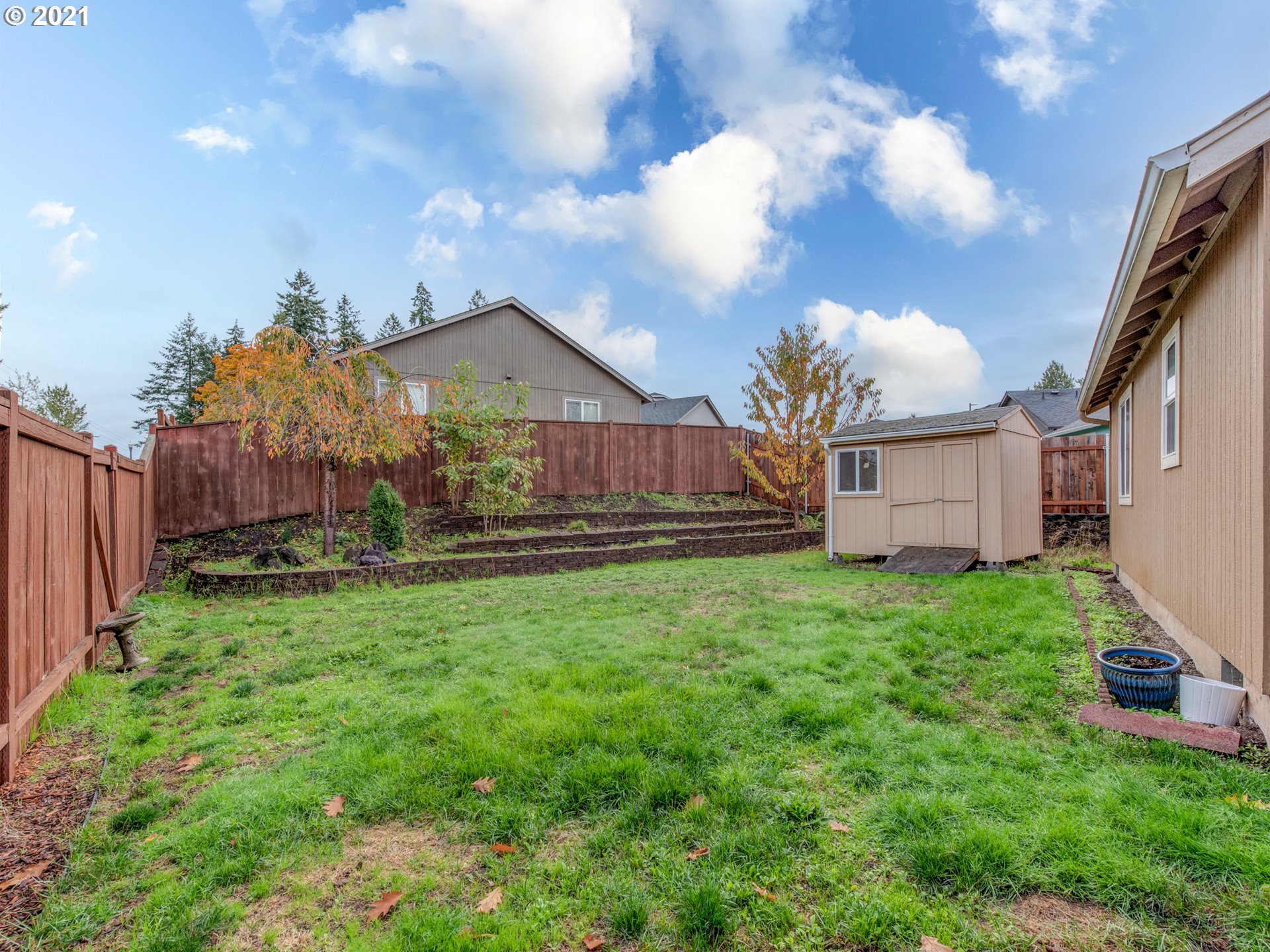 4808 Holly Street Springfield, OR 97478 - Photo 22 of 27 a view of a house with backyard and garden
