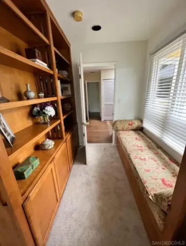 a view of a living room and a window