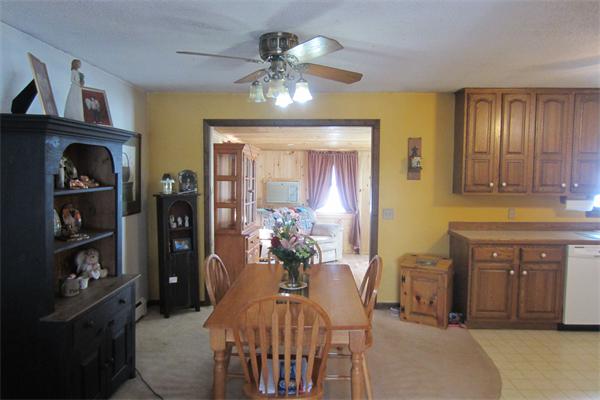 325 Mason Rd Extension Dudley, MA 01571 - Photo 11 of 30 a dining room with furniture and chandelier