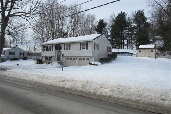 325 Mason Rd Extension Dudley, MA 01571 - Photo 2 of 30 a white house that has a tree on the side of it