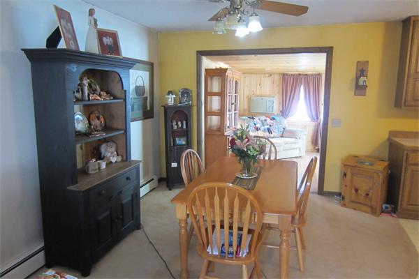 325 Mason Rd Extension Dudley, MA 01571 - Photo 8 of 30 a dining room with furniture and window