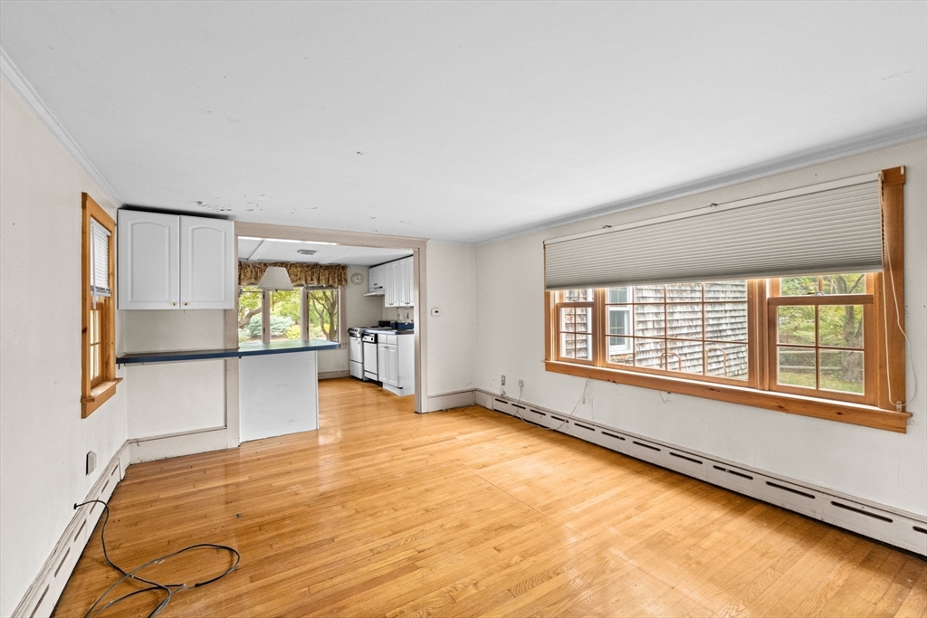 89 Ripley Road Cohasset, MA 02025 - Photo 3 of 23 a view of an empty room and window