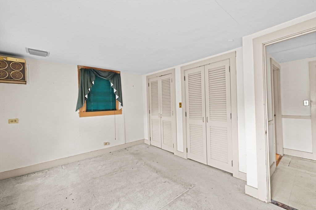 89 Ripley Road Cohasset, MA 02025 - Photo 9 of 23 an empty room with windows