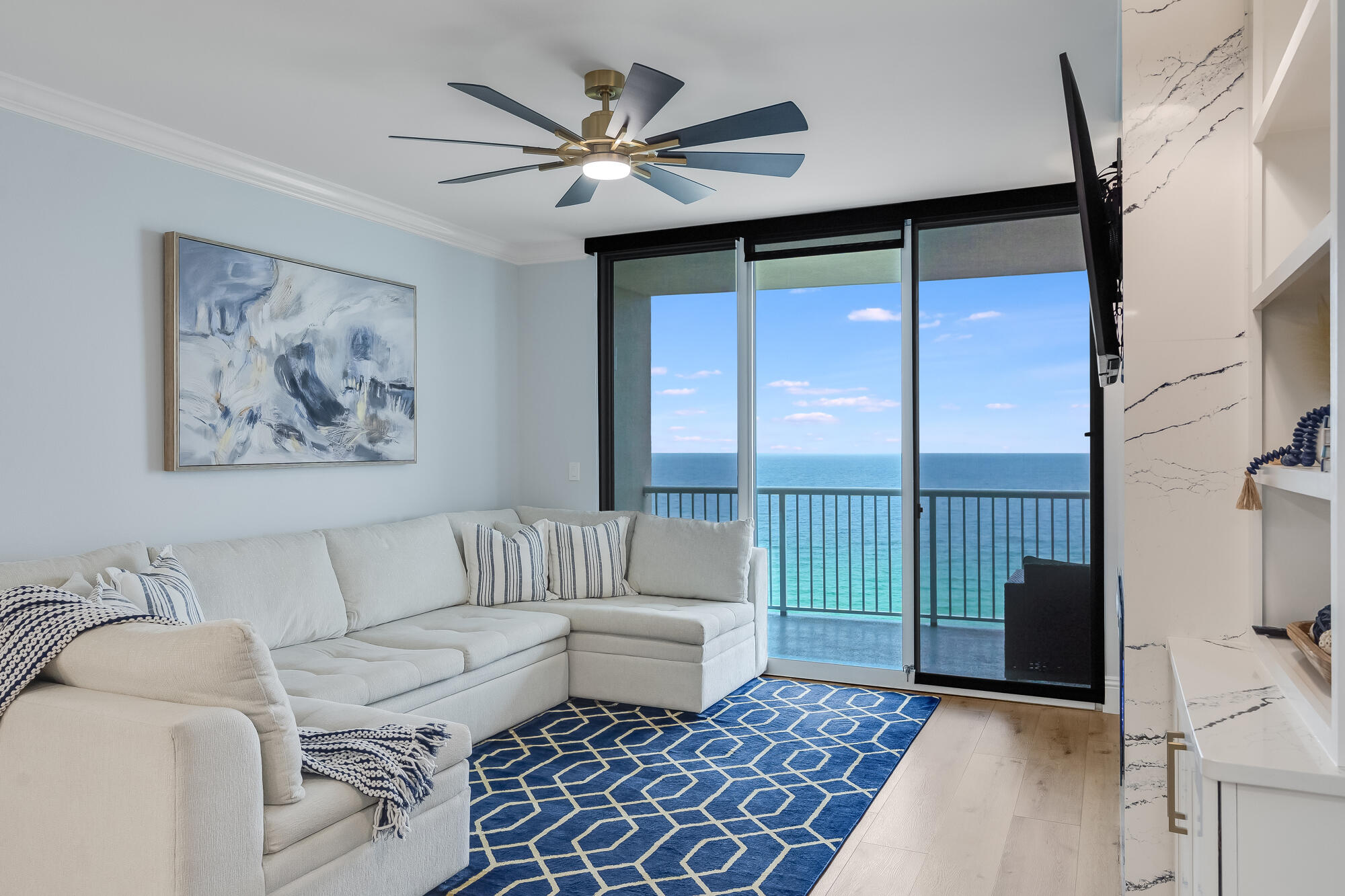 17281 Front Beach Road, Unit 802 Panama City Beach, FL 32413 - Photo 13 of 57 a living room with furniture and a large window