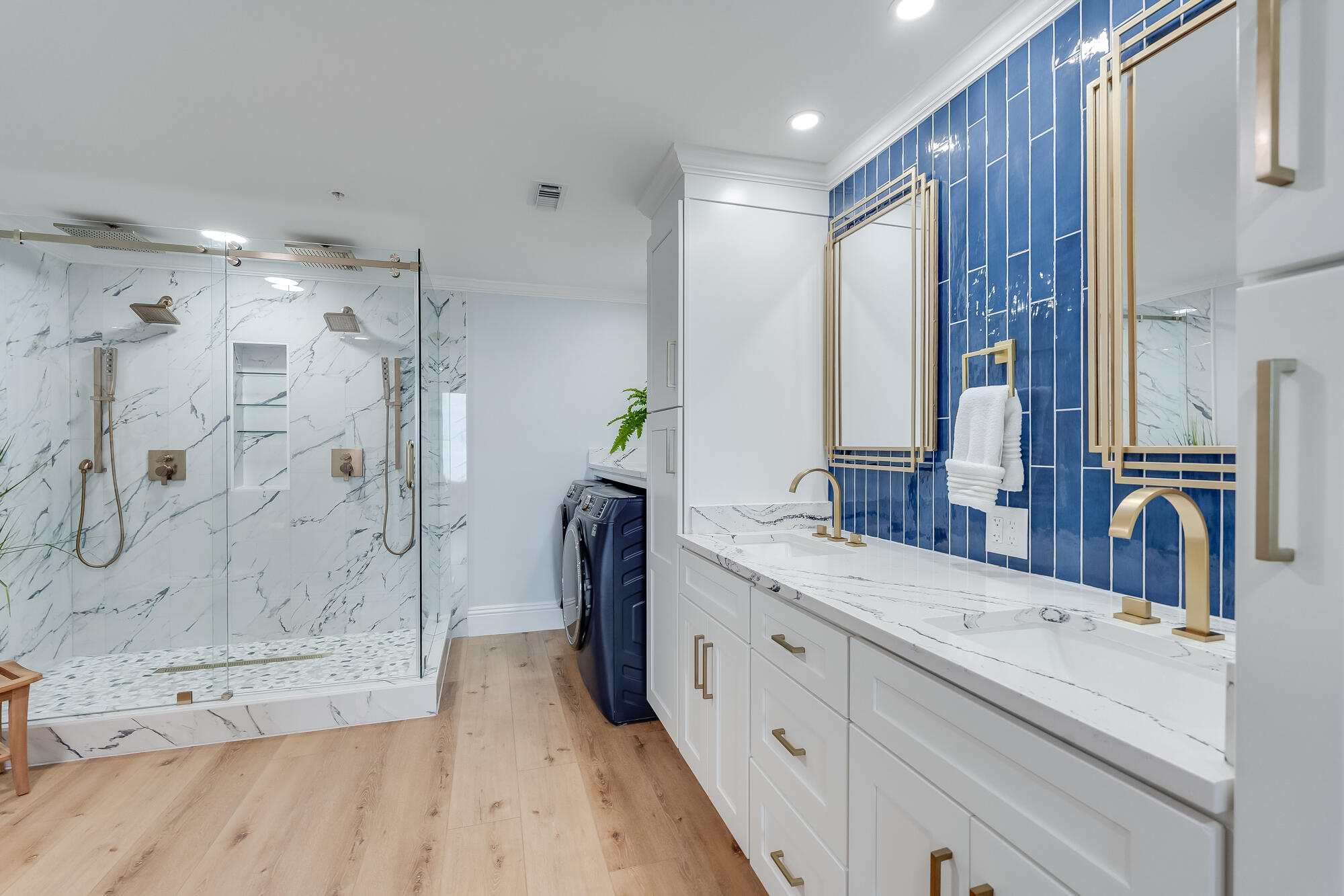 17281 Front Beach Road, Unit 802 Panama City Beach, FL 32413 - Photo 24 of 57 a bathroom with a double vanity sink mirror double and shower