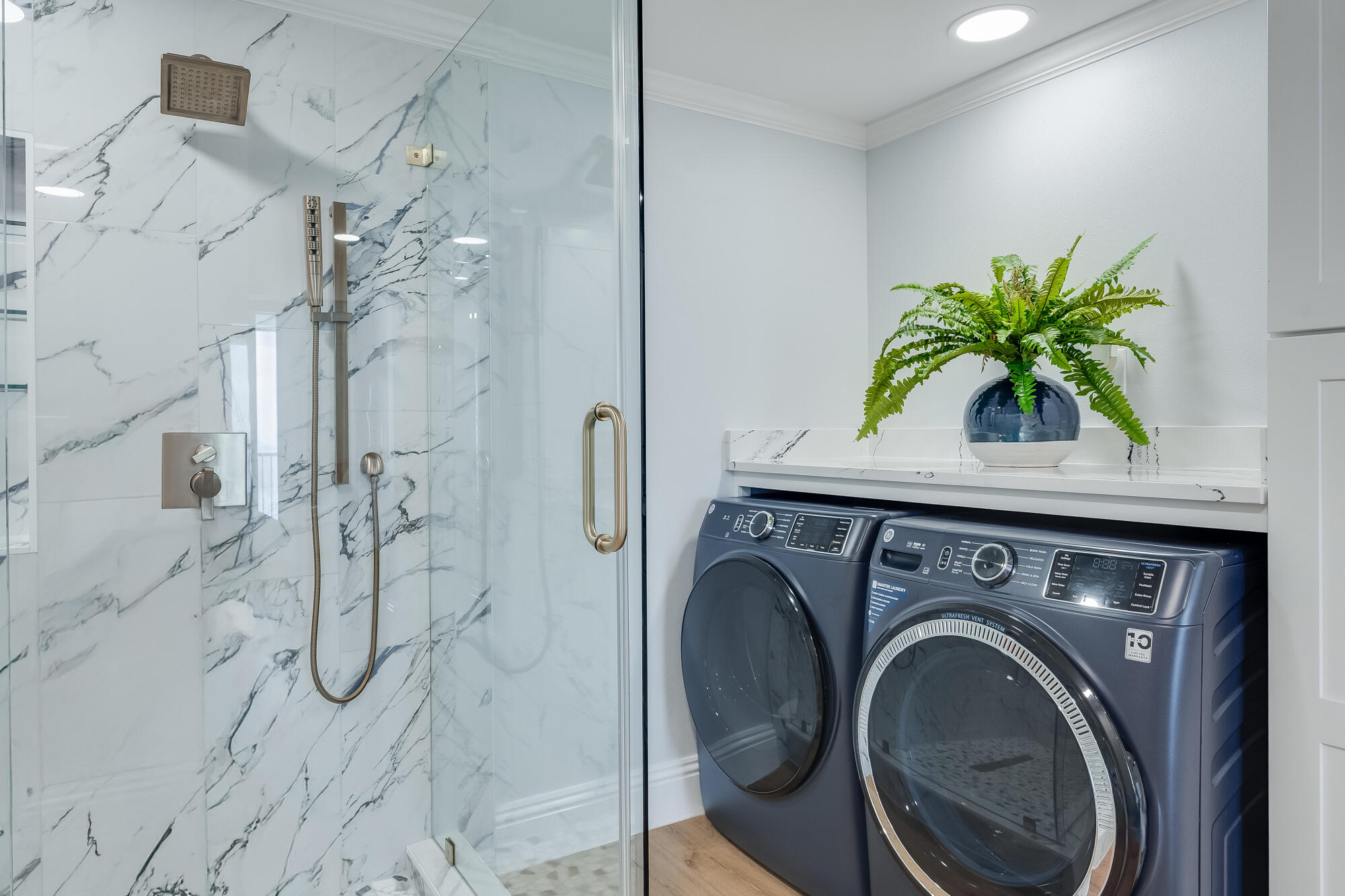 17281 Front Beach Road, Unit 802 Panama City Beach, FL 32413 - Photo 27 of 57 a utility room with shower and mirror