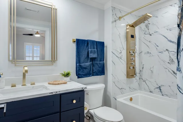 a bathroom with a shower and a sink