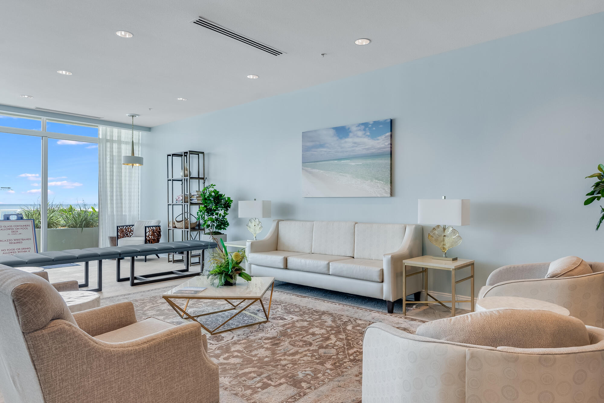 17281 Front Beach Road, Unit 802 Panama City Beach, FL 32413 - Photo 52 of 57 a living room with furniture and a table