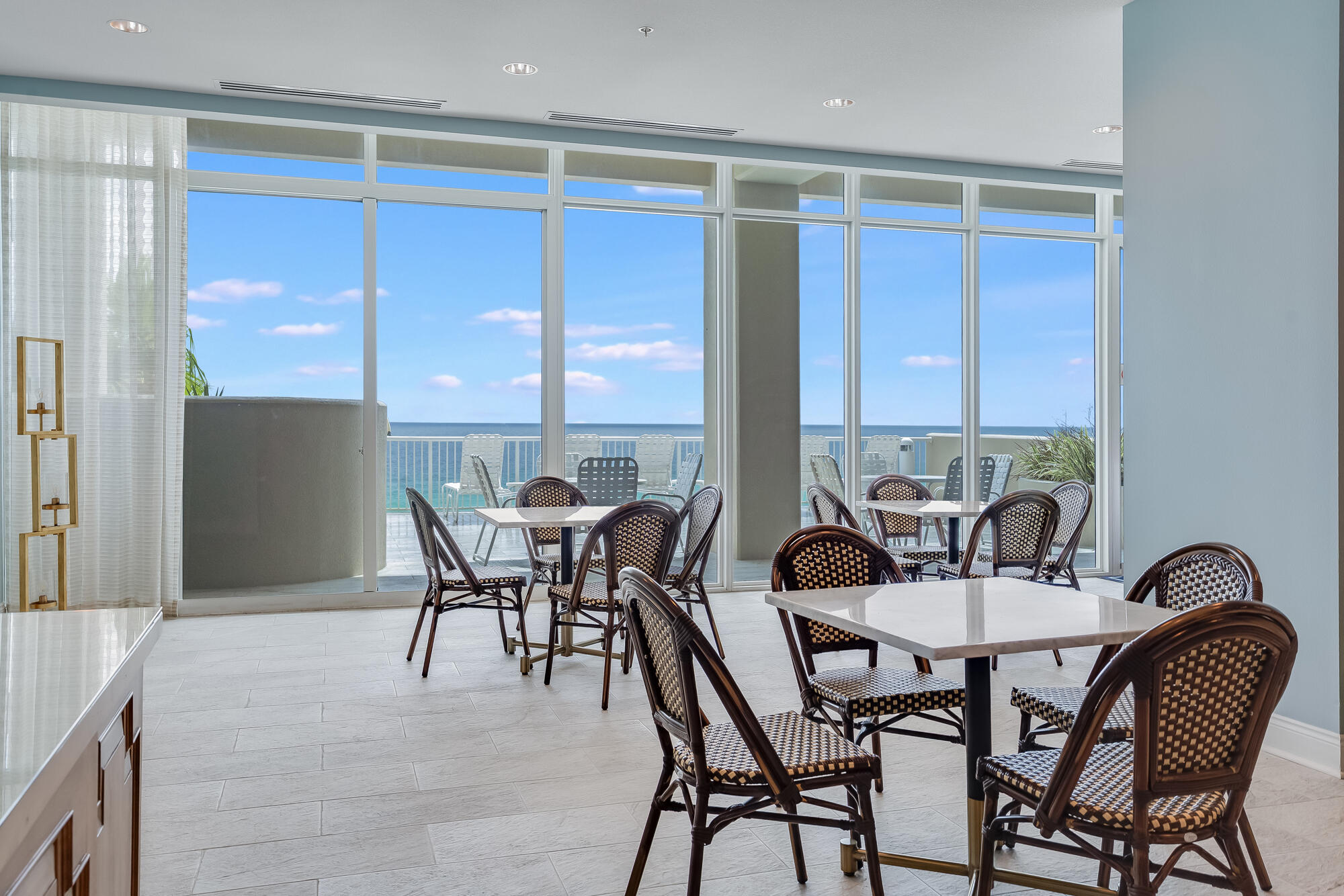17281 Front Beach Road, Unit 802 Panama City Beach, FL 32413 - Photo 53 of 57 a view of a dining room with furniture and window