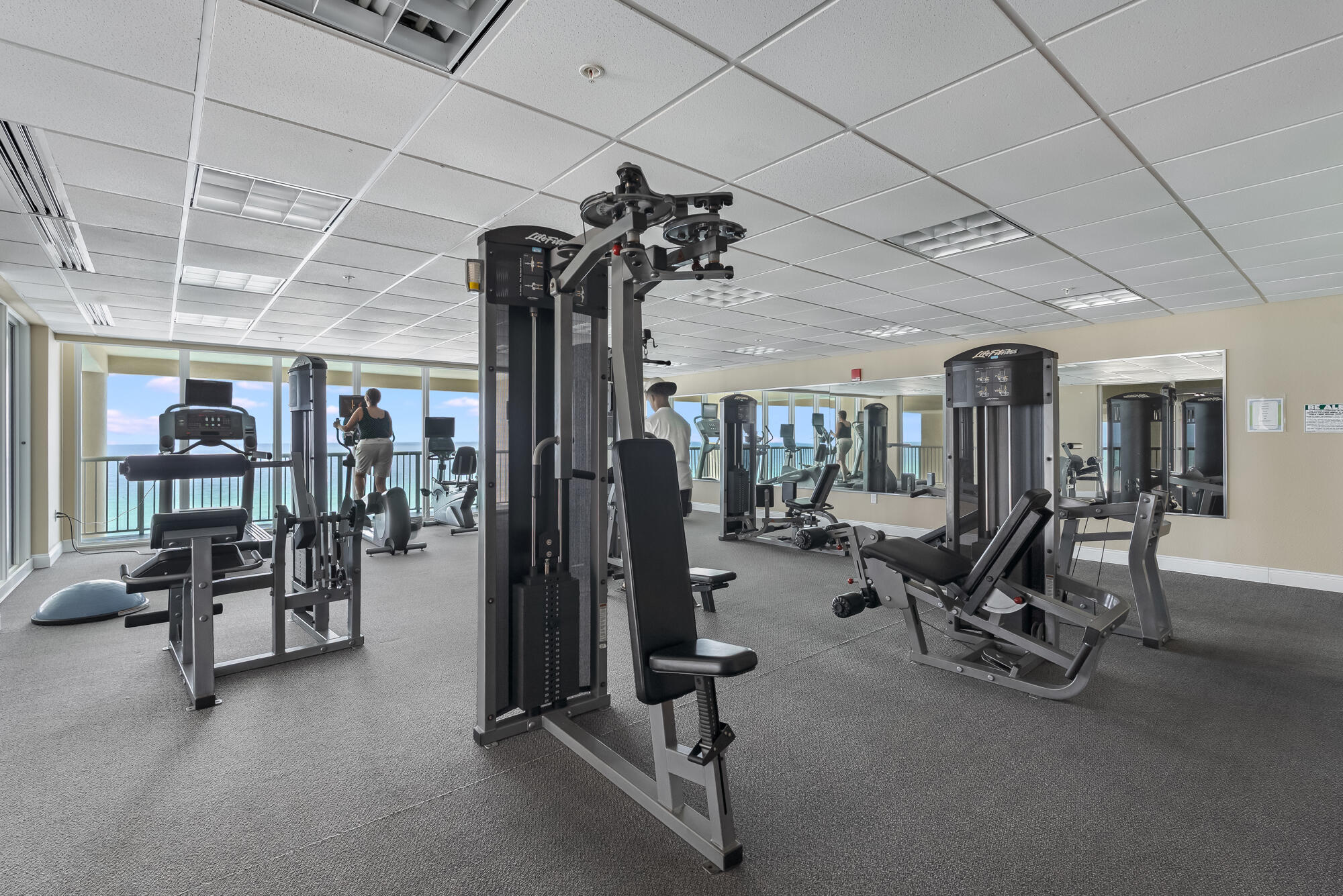 17281 Front Beach Road, Unit 802 Panama City Beach, FL 32413 - Photo 54 of 57 a view of a room with gym equipment