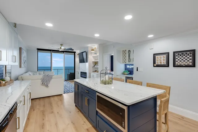 a kitchen with a stove and a sink