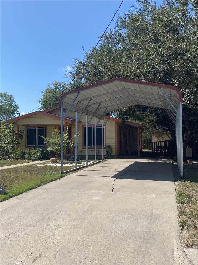 205 Monterrey Street Alice, TX 78332 - Photo 31 of 33 a front view of house with yard and green space