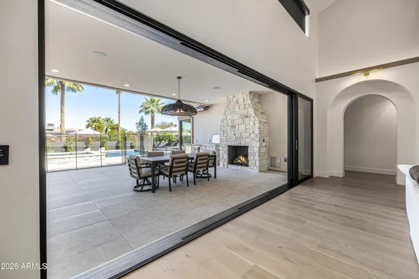 a kitchen with stainless steel appliances granite countertop a refrigerator and a stove