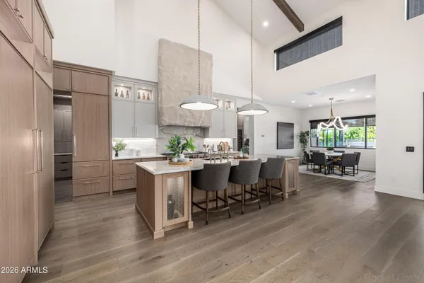 a kitchen with stainless steel appliances a stove and a refrigerator