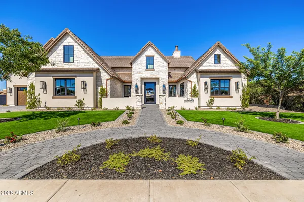 a view of front of house with a yard