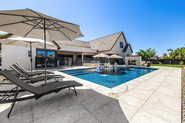 a living room with patio furniture