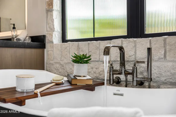 an aerial view of a house with outdoor space