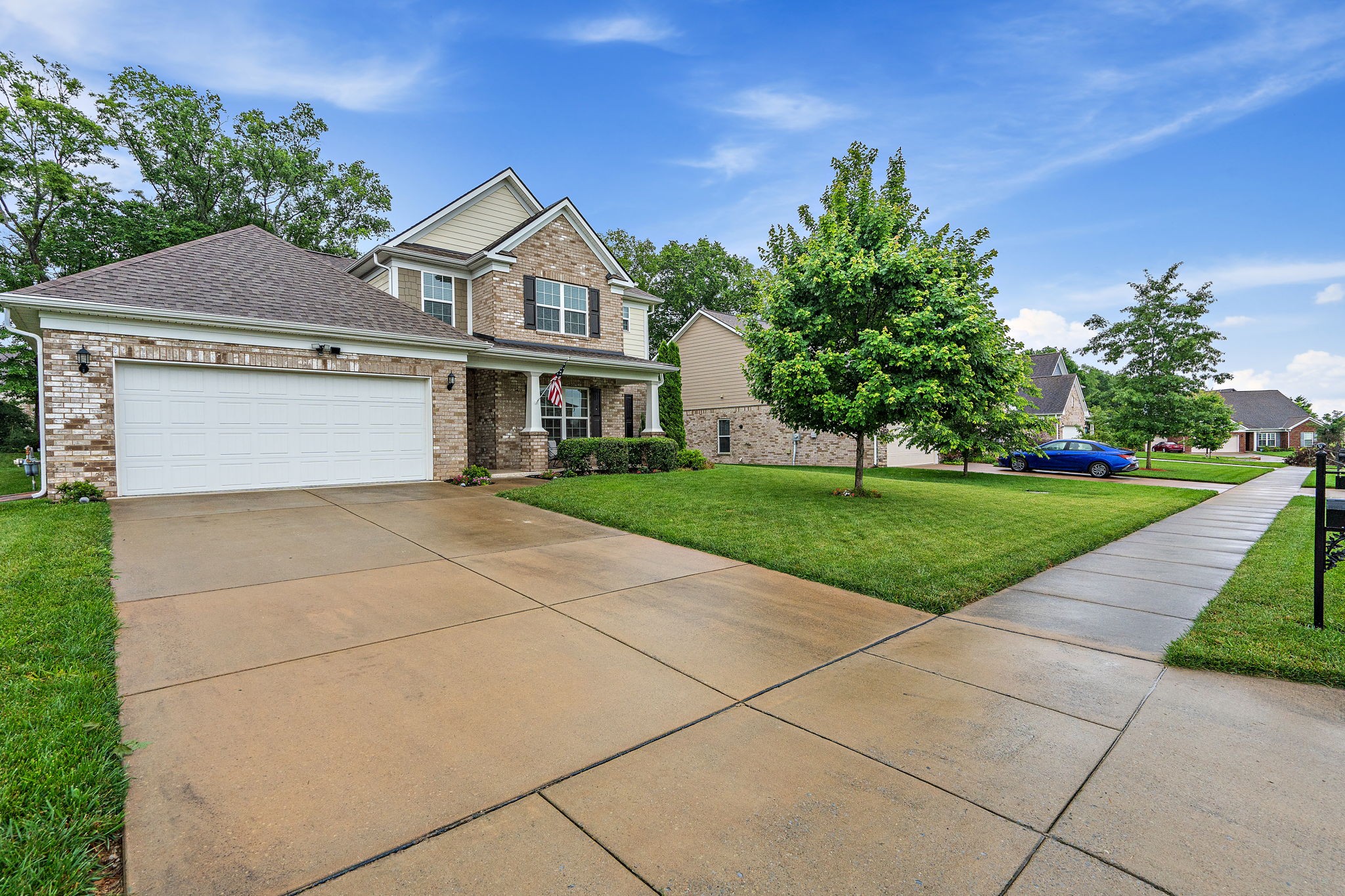 4012 Compass Pointe Court Thompson's Station, TN 37179 - Photo 1 of 54 a front view of house with yard