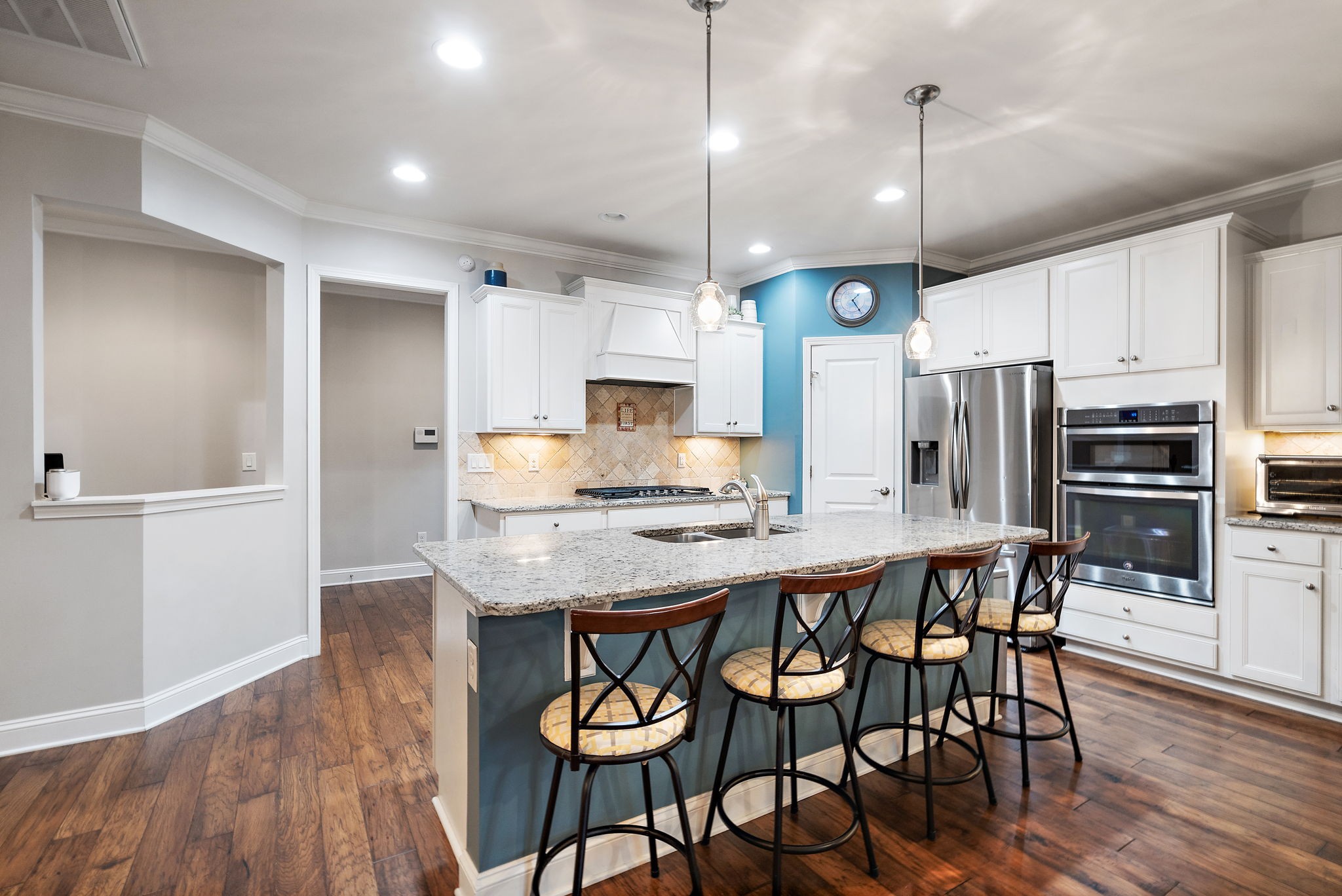 4012 Compass Pointe Court Thompson's Station, TN 37179 - Photo 14 of 54 a kitchen with stainless steel appliances granite countertop a kitchen island hardwood floor and a sink