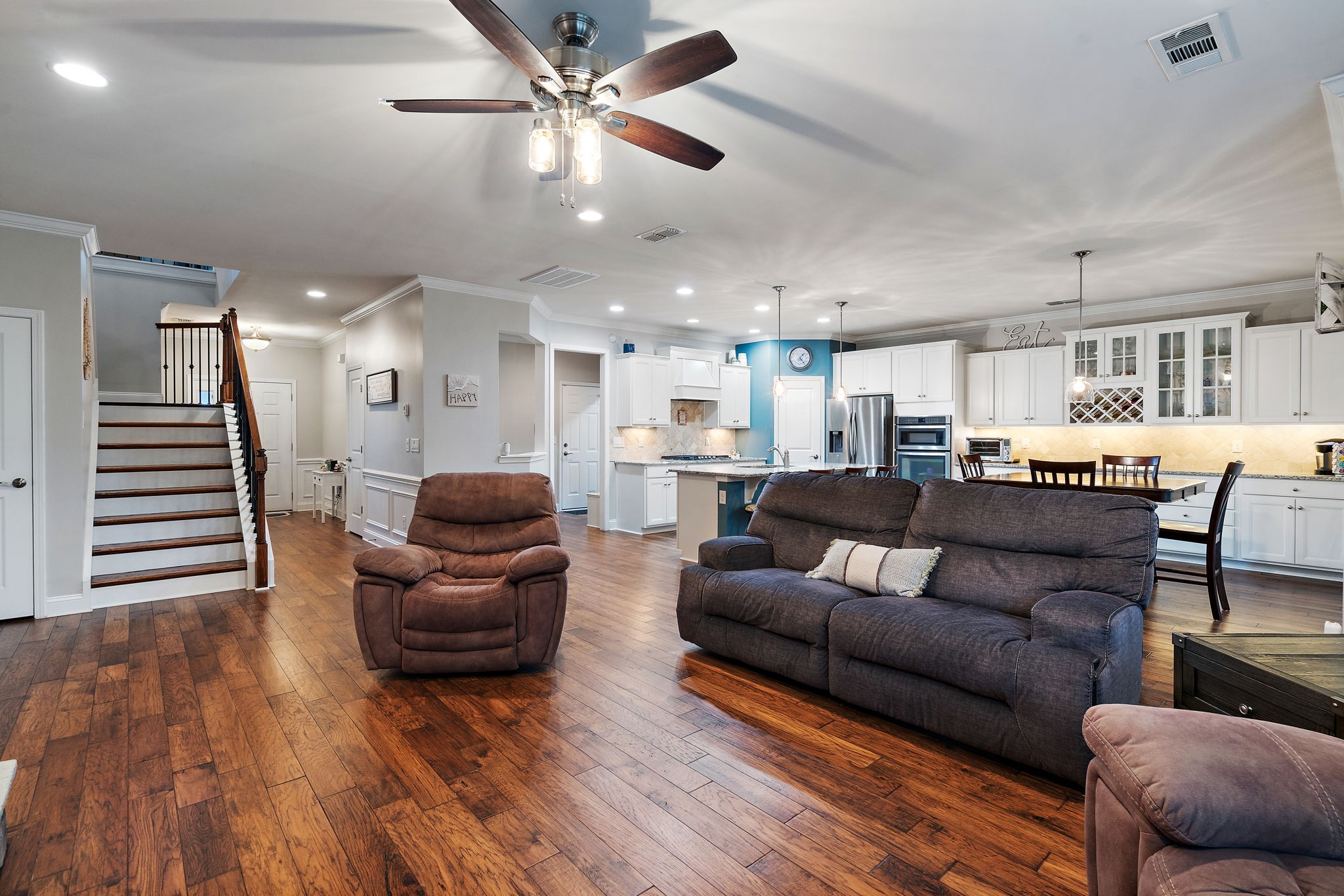 4012 Compass Pointe Court Thompson's Station, TN 37179 - Photo 19 of 54 a living room with furniture and wooden floor