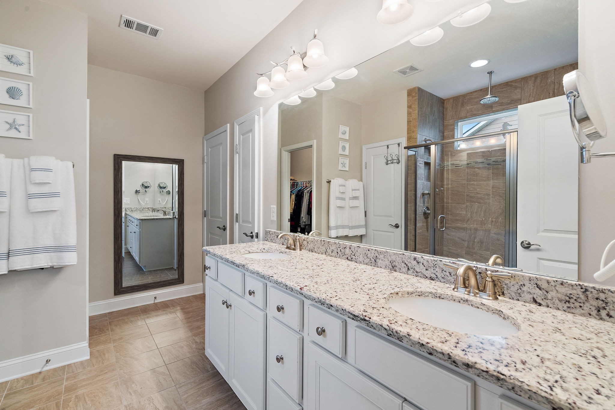 4012 Compass Pointe Court Thompson's Station, TN 37179 - Photo 25 of 54 a spacious bathroom with a granite countertop sink a mirror and shower