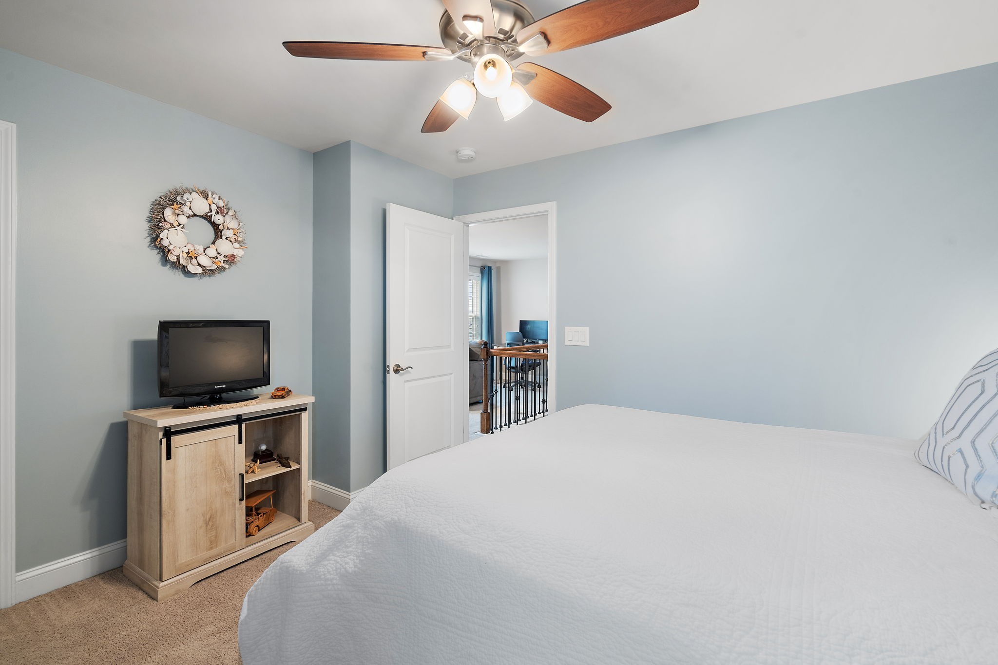 4012 Compass Pointe Court Thompson's Station, TN 37179 - Photo 34 of 54 a bedroom with a bed and a flat screen tv