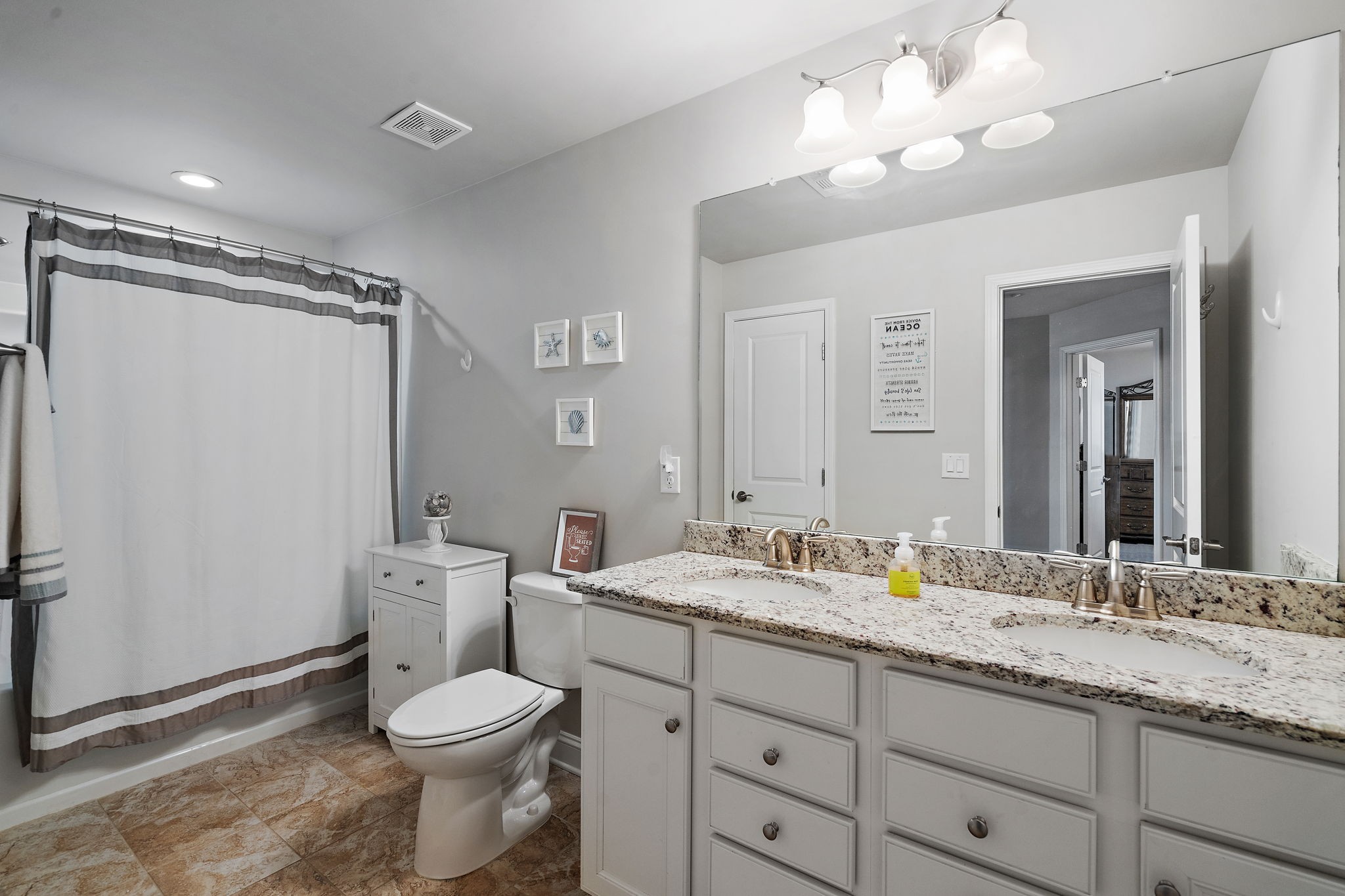 4012 Compass Pointe Court Thompson's Station, TN 37179 - Photo 40 of 54 a bathroom with a granite countertop toilet sink and mirror