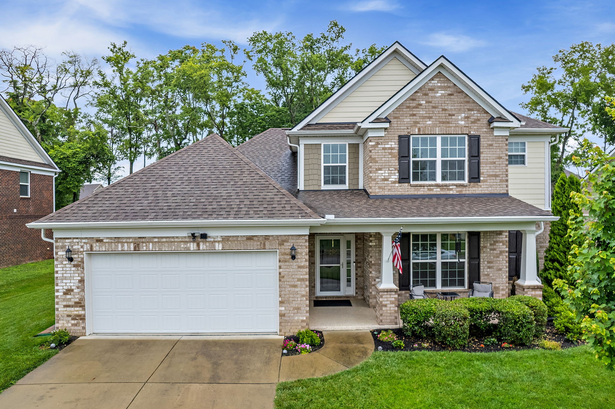 4012 Compass Pointe Court Thompson's Station, TN 37179 - Photo 51 of 54 a view of a house with a yard and plants