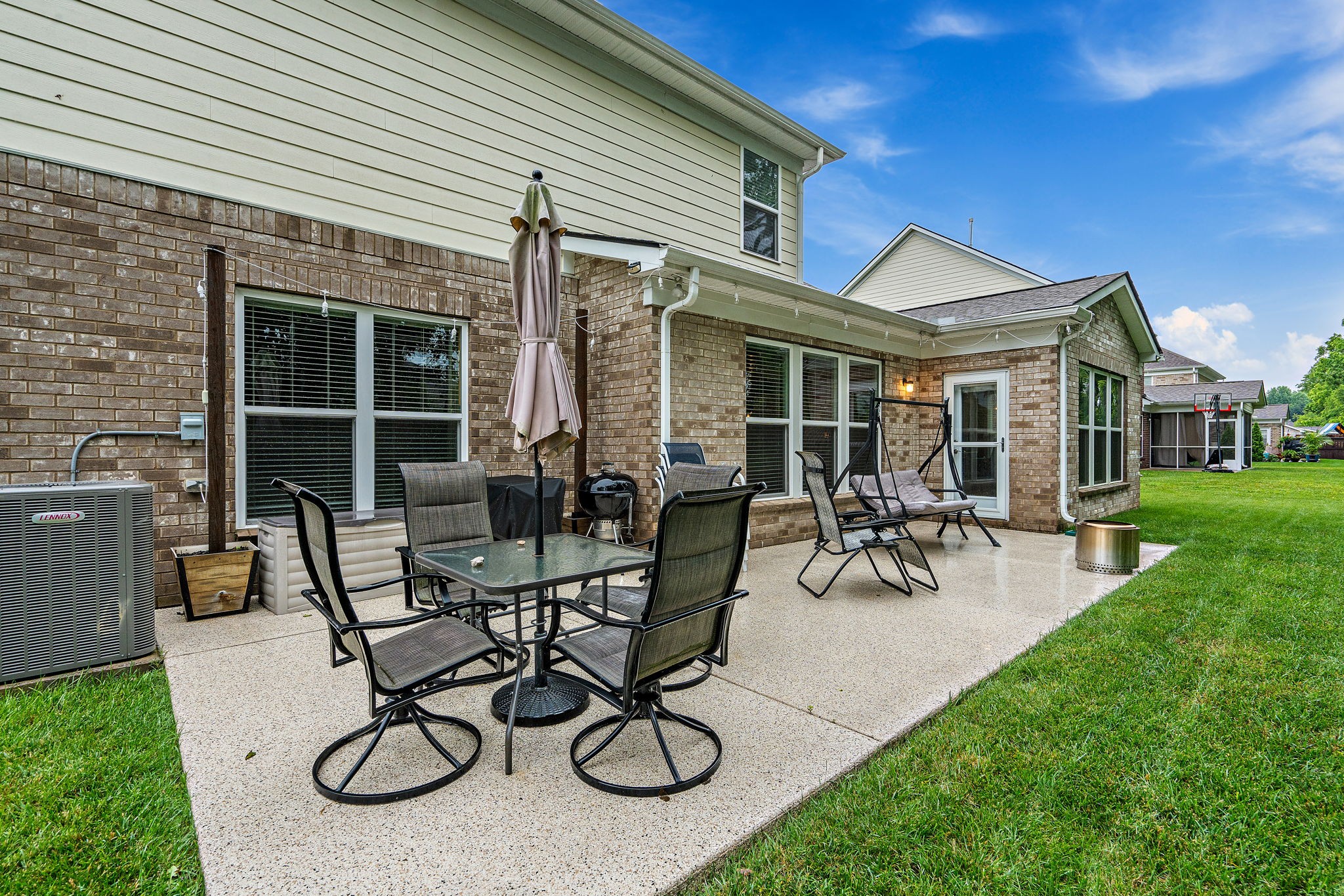 4012 Compass Pointe Court Thompson's Station, TN 37179 - Photo 6 of 54 a view of a house with patio and a yard