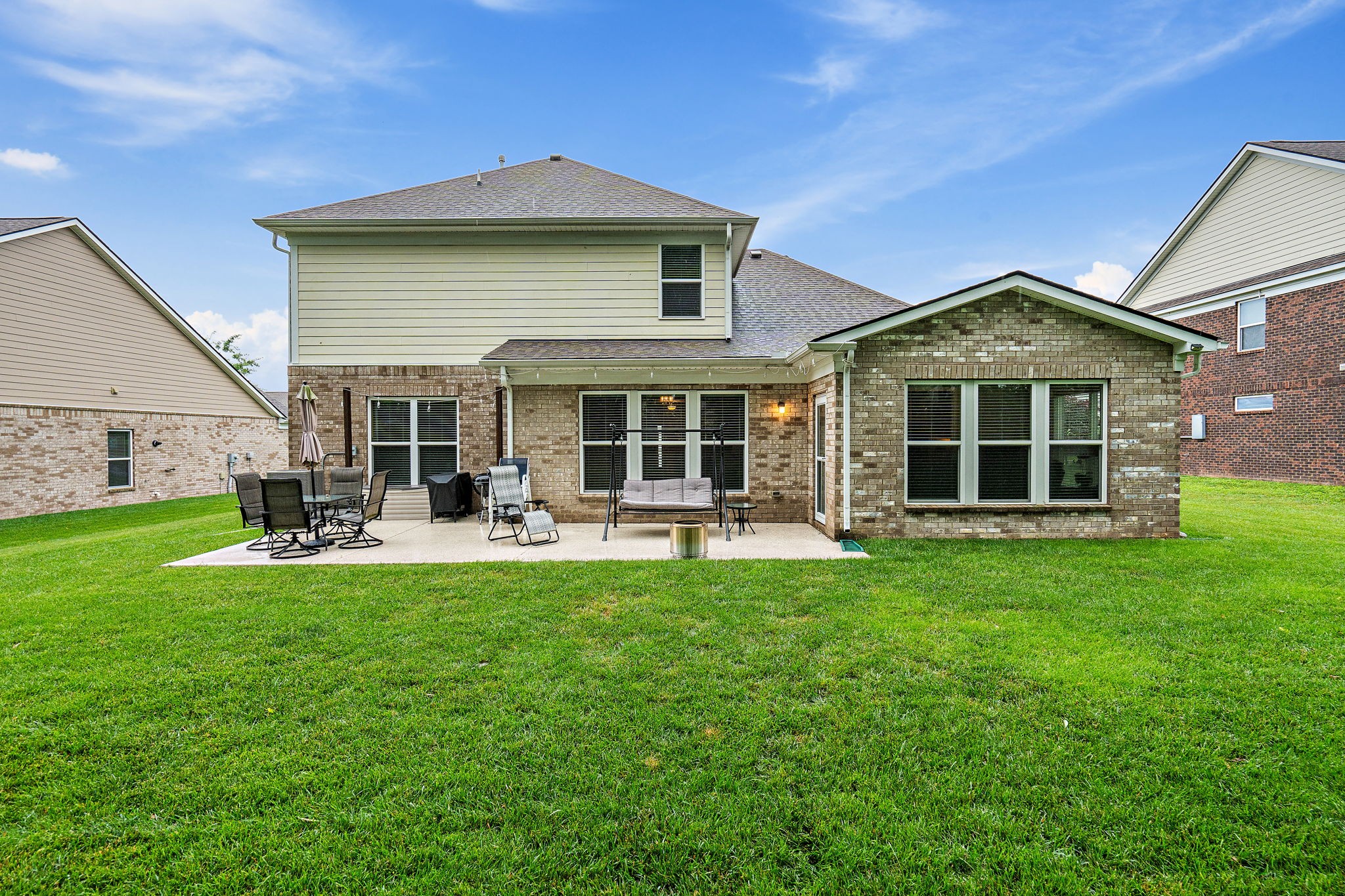 4012 Compass Pointe Court Thompson's Station, TN 37179 - Photo 8 of 54 a front view of a house with yard patio and green space
