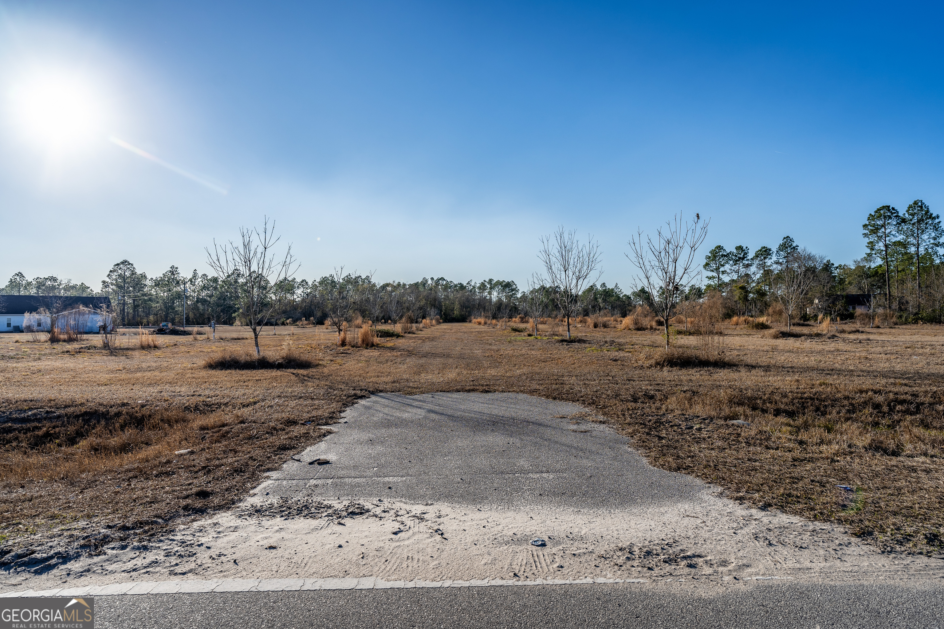 0 Moonshadow Road Homerville, GA 31634 - Photo 10 of 15 a view of dirt yard with a barn