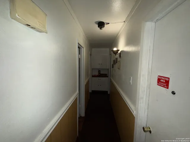 a view of hallway with stairs