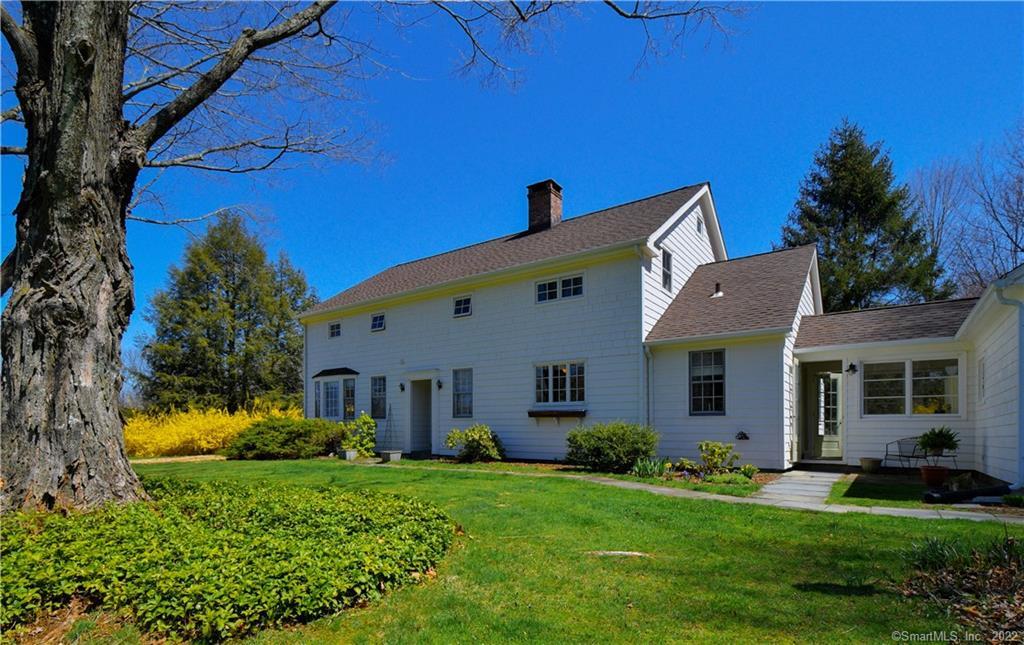 32 Hut Hill Road Bridgewater, CT 06752 - Photo 1 of 1 a front view of a house with a yard