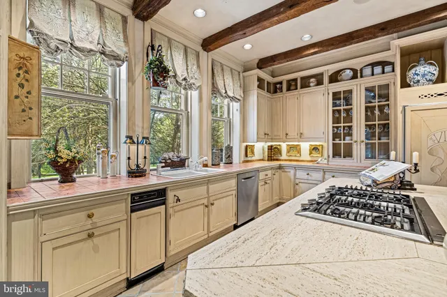a view of a chairs and table in a patio