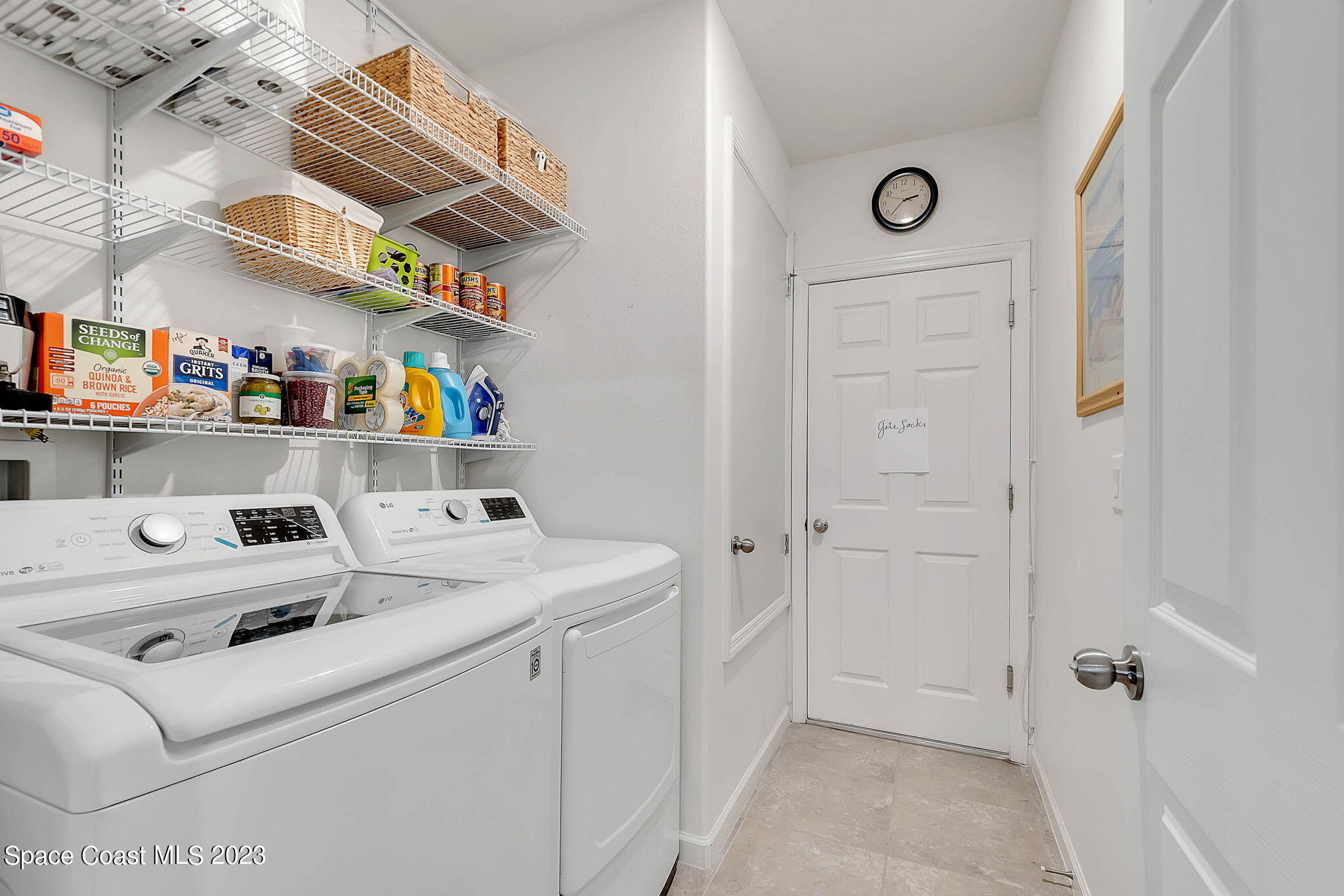 3536 Whimsical Circle Rockledge, FL 32955 - Photo 14 of 40 a utility room with dryer and washer