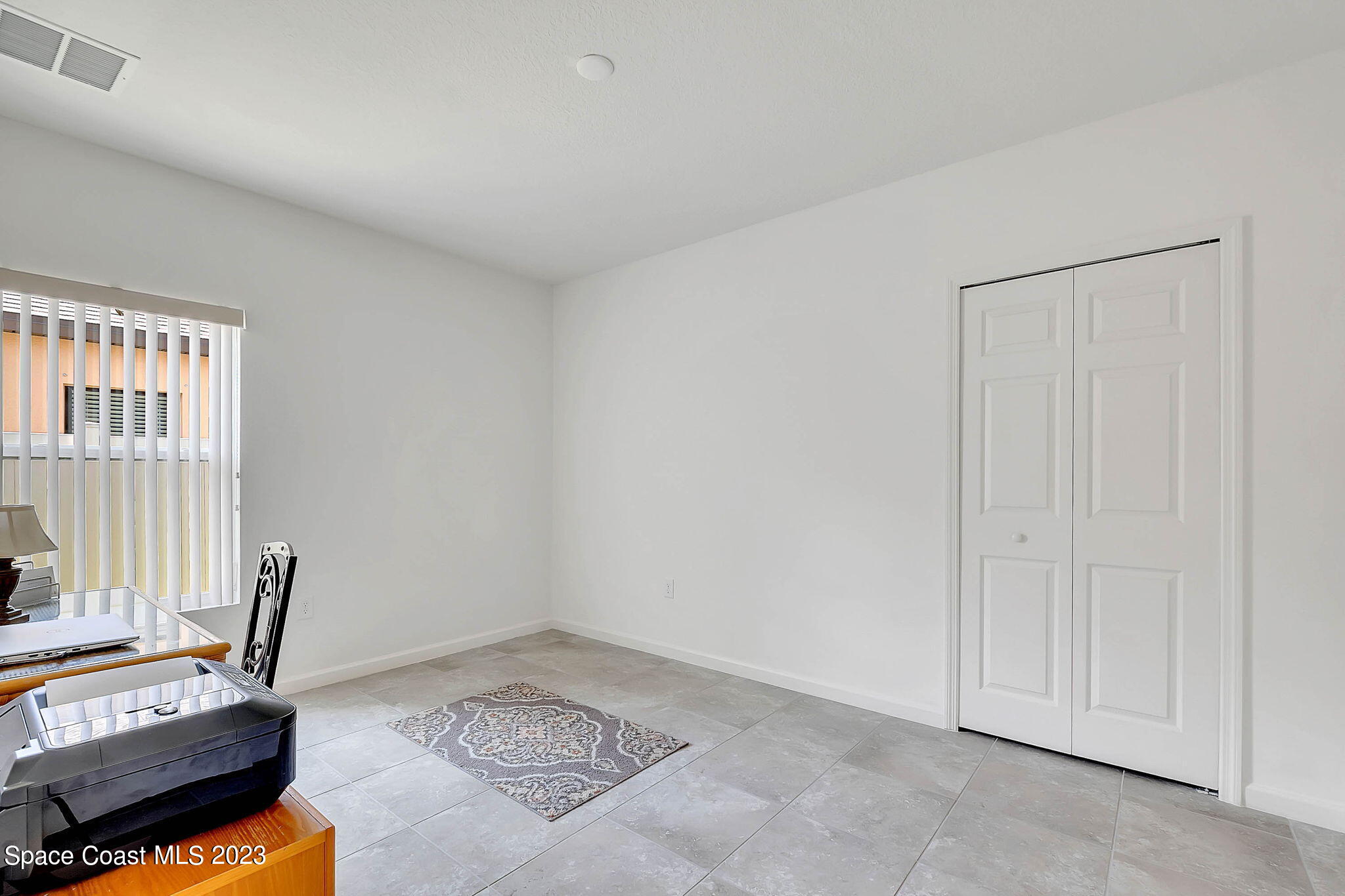 3536 Whimsical Circle Rockledge, FL 32955 - Photo 18 of 40 a view of a room with furniture and window