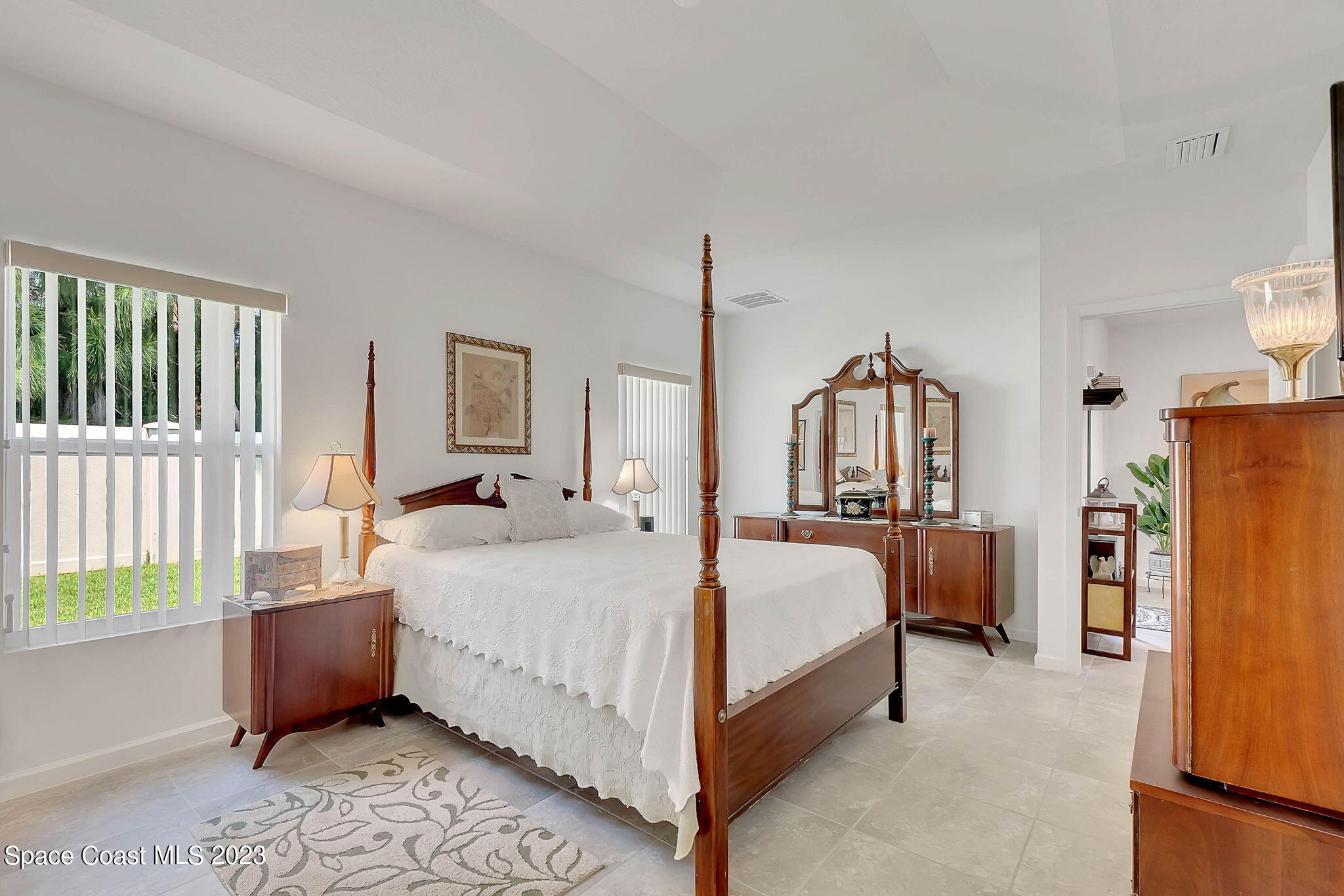 3536 Whimsical Circle Rockledge, FL 32955 - Photo 21 of 40 a bed room with a bed and a window