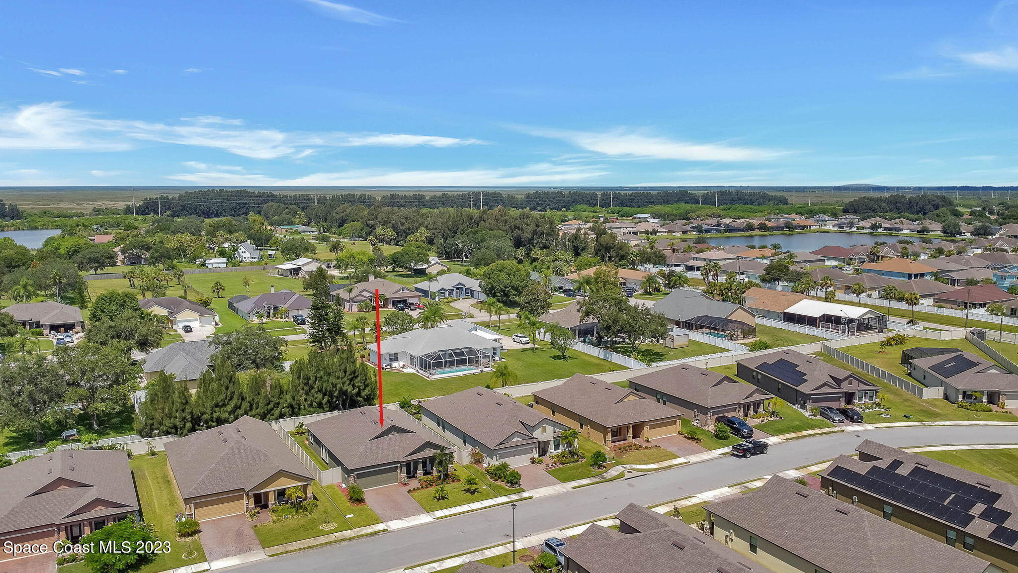 3536 Whimsical Circle Rockledge, FL 32955 - Photo 32 of 40 an aerial view of residential houses with outdoor space