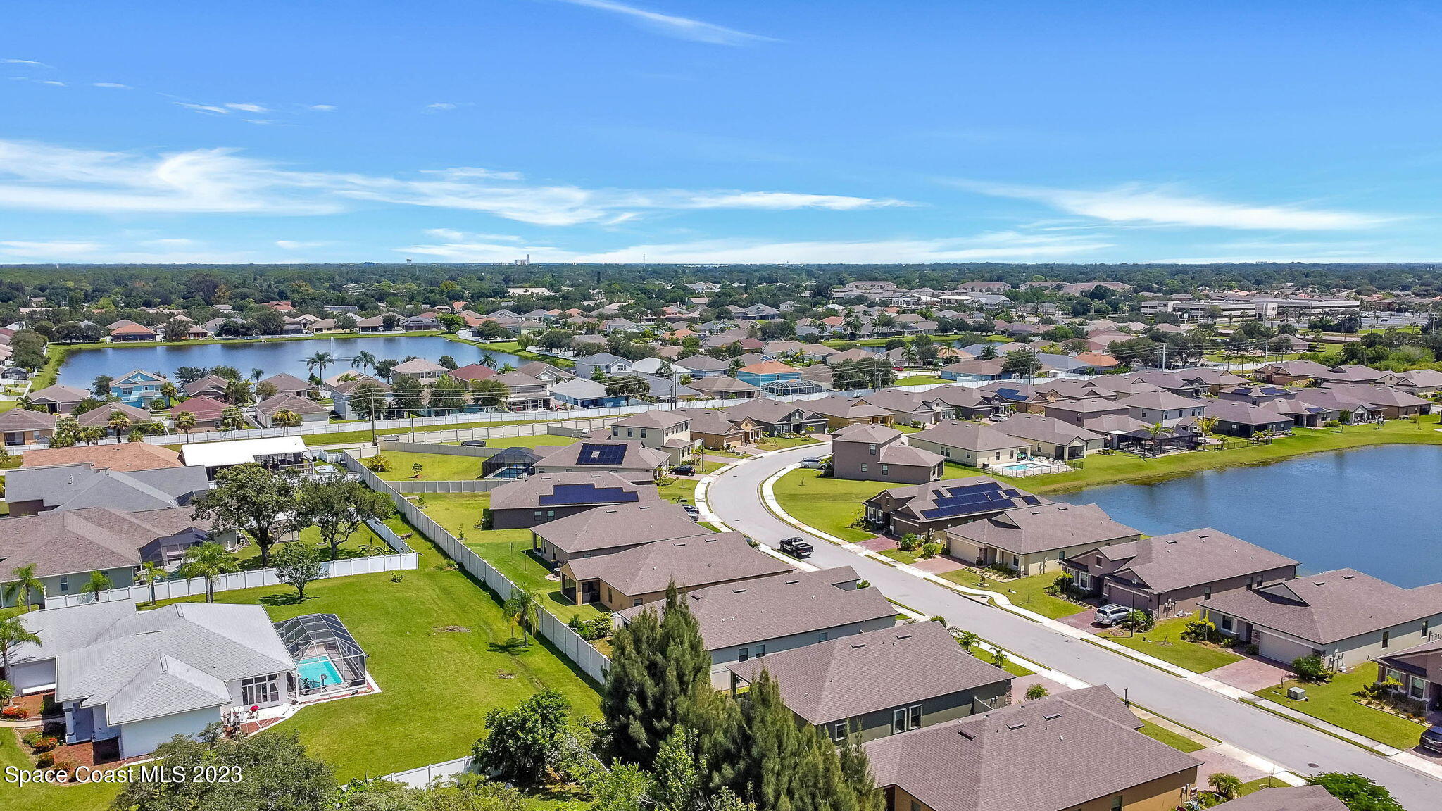 3536 Whimsical Circle Rockledge, FL 32955 - Photo 33 of 40 an aerial view of a houses with a swimming pool