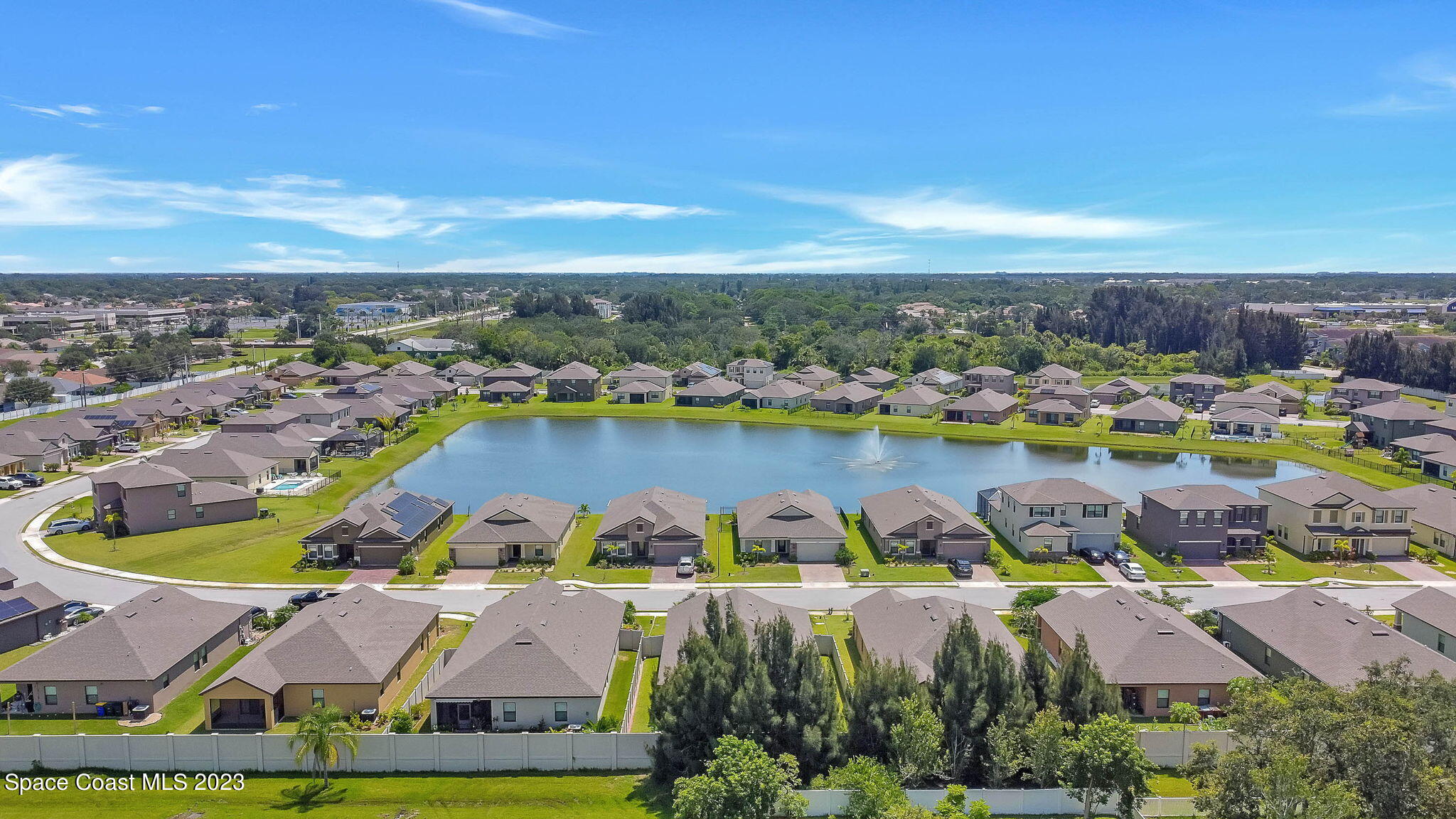 3536 Whimsical Circle Rockledge, FL 32955 - Photo 35 of 40 a view of a lake with a city