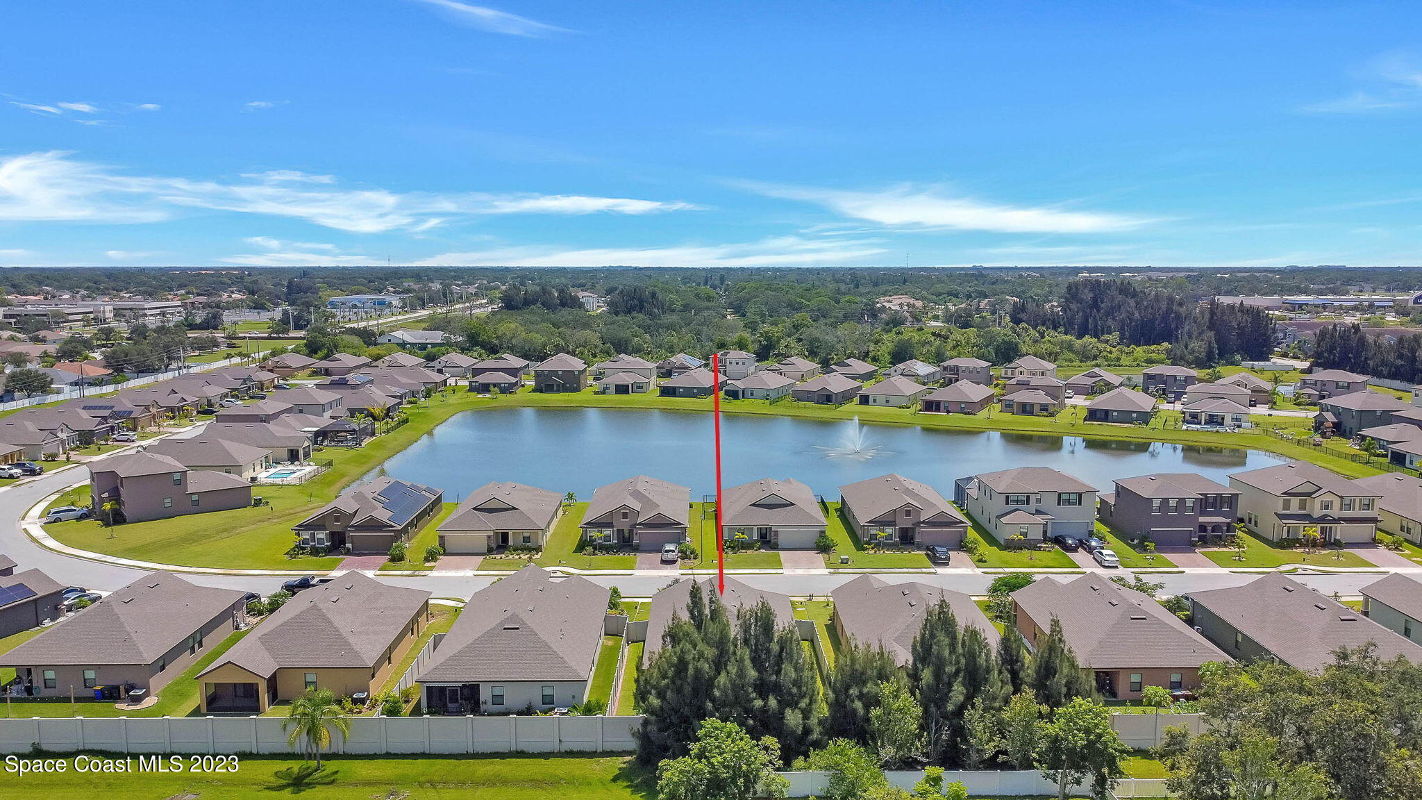 3536 Whimsical Circle Rockledge, FL 32955 - Photo 36 of 40 a view of a city with lots of residential buildings ocean and mountain view in back