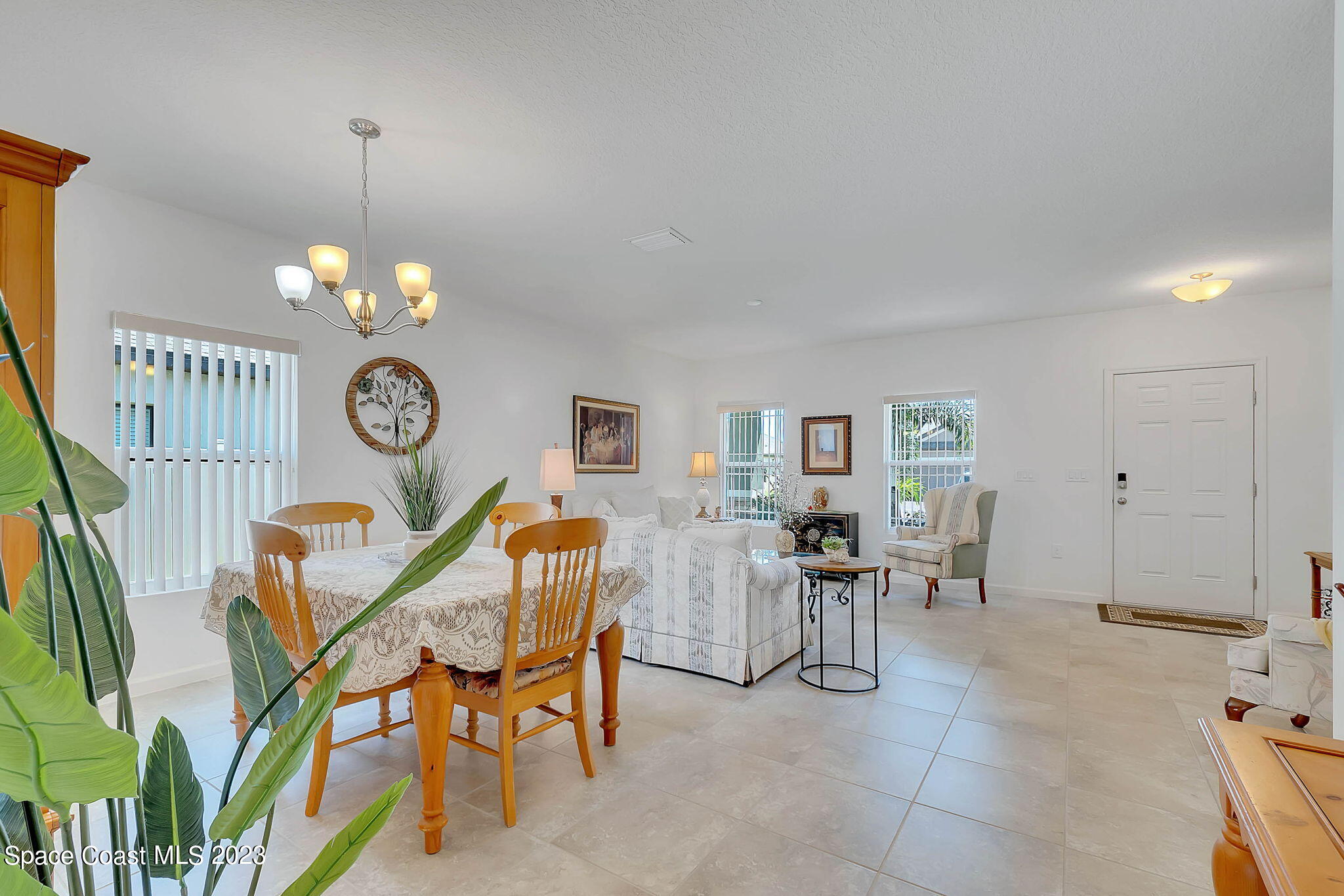 3536 Whimsical Circle Rockledge, FL 32955 - Photo 7 of 40 a view of a dining room and a livingroom