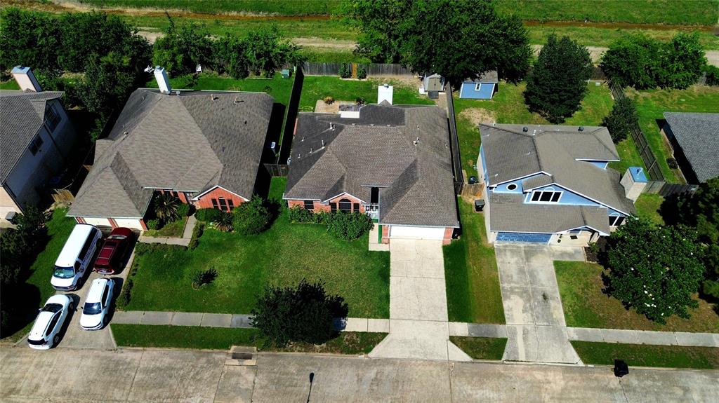 13618 Sablegrove Lane Houston, TX 77014 - Photo 4 of 30 an aerial view of a house with garden space and street view