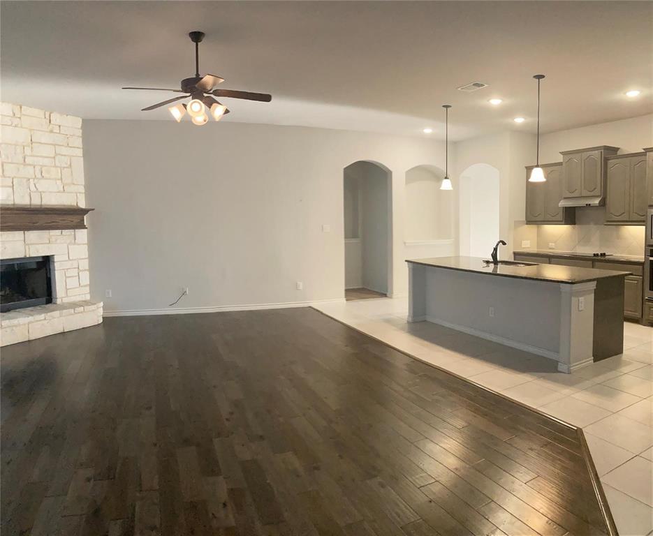1566 Country Crest Drive Waxahachie, TX 75165 - Photo 7 of 12 a view of kitchen with sink and wooden floor