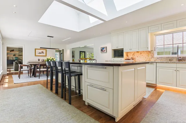 a utility room with sink dryer and washer
