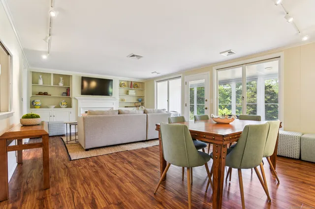 a bedroom with two beds and a window