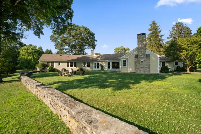 a picture of a bathroom with a sink and a mirror