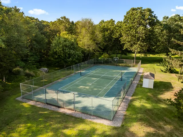 a kitchen with stainless steel appliances kitchen island wooden cabinets and granite counter tops